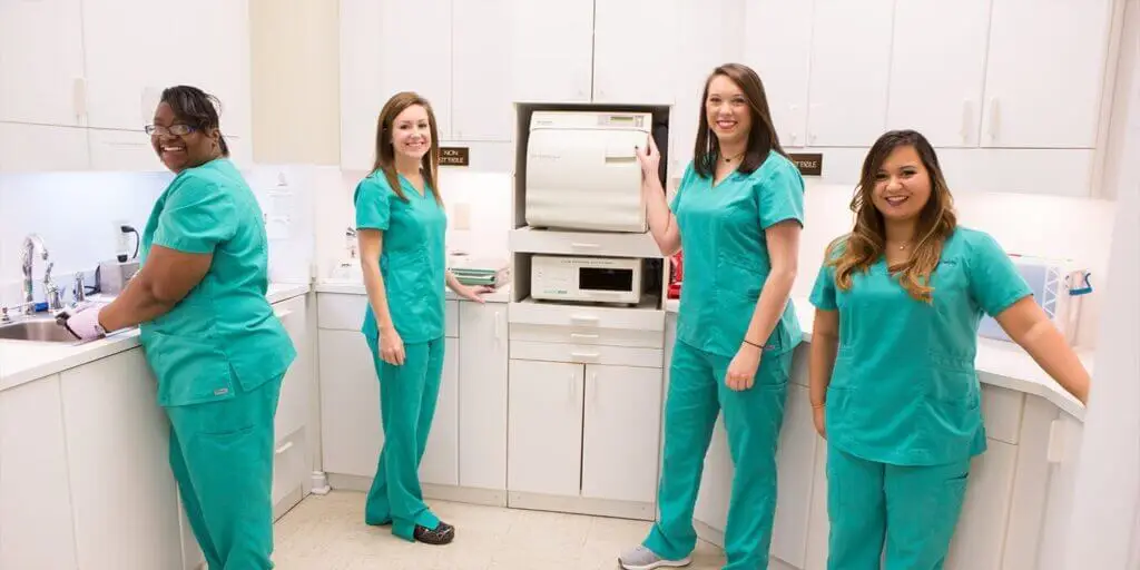Montgomery Dentistry staff smiling in their office