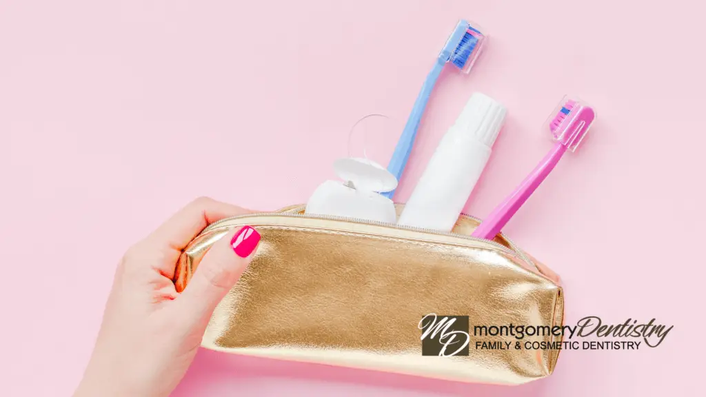 a go bag with toothbrush, toothpaste, and floss on a pick background to show oral health tips for busy families