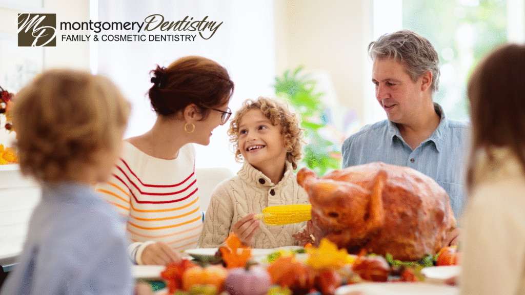 Smiling family around Thanksgiving dinner
